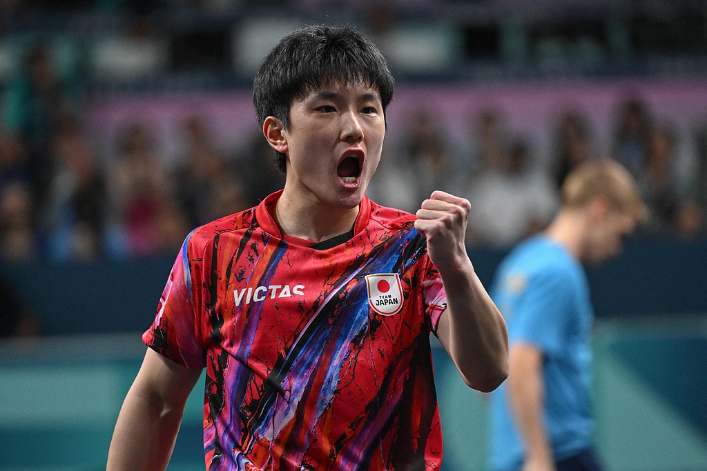 爱游戏APP-德国队鏖战日本队，张本智和点燃赛场